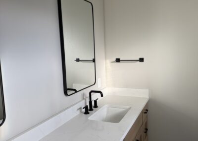 Double bathroom sink with modern finishings in Custom Home with Lockoff ADU in Buena Vista by S&T Construction 68E4529F D60F 41B9 AFCB 61D8BBDFC560 1 105 c