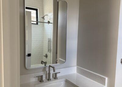 Single bathroom sinkwith modern finishings in Custom Home with Lockoff ADU in Buena Vista by S&T Construction 19DE022B CA5A 43B3 88AF 529E28BD7C16 1 102 o